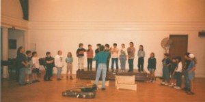 preparing young singers for a performance, Blue Rock School, 1994