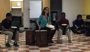 Nashville Symphony Education & Community Engagement Assistant Kristen Freeman leads a drum circle activity at our NAZA program at Hartman Park Community Center, Nashville